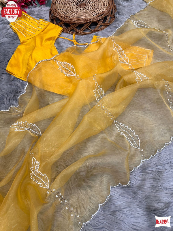 Mustard Yellow Pure Organza Silk Hand Pearl And Cut-work Designer Saree