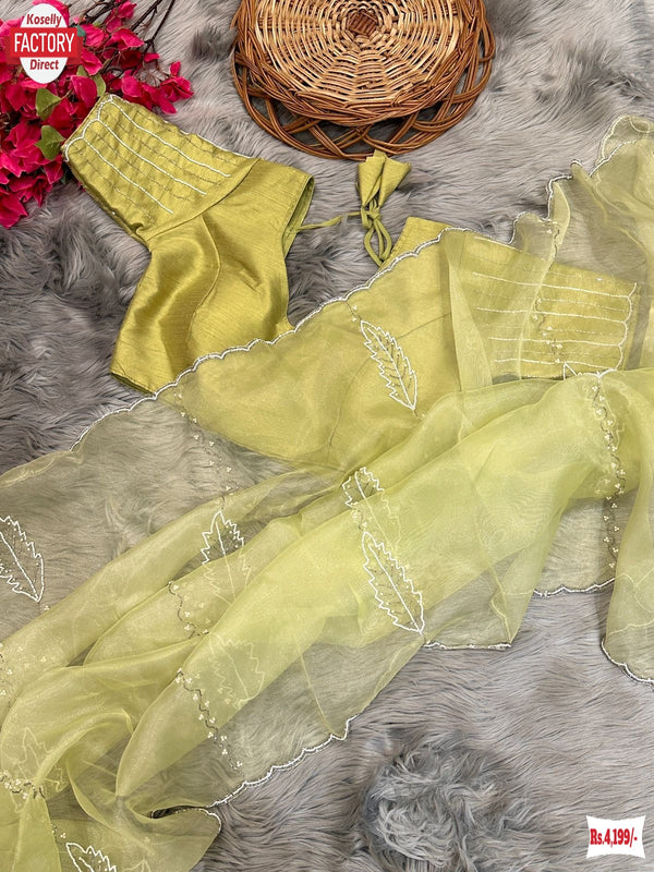 Light Green Pure Organza Silk Hand Pearl And Cut-work Designer Saree