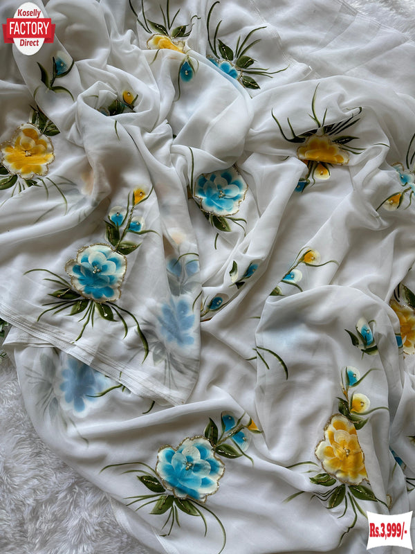 Georgette Hand Work And Hand Painted Saree With Blue Stitched Blouse