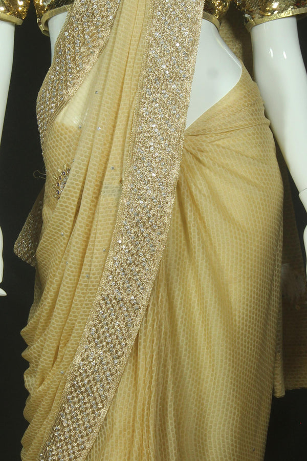 Golden Saree with heavy embroidery