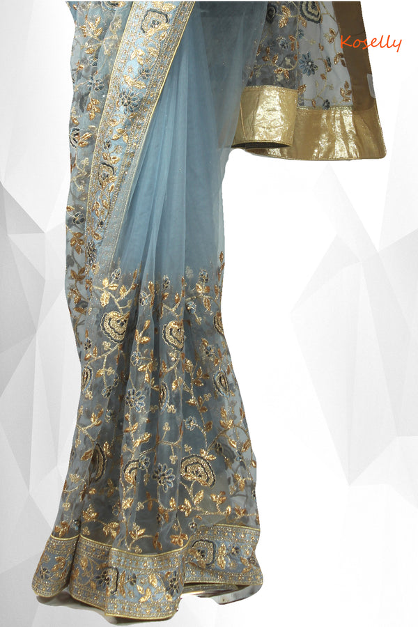 Ash colored net embroidered saree