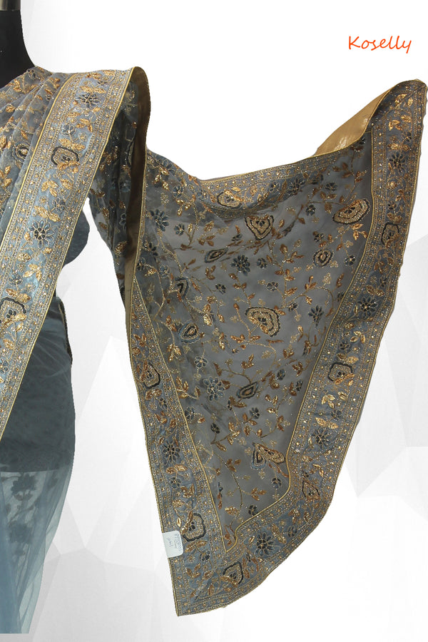 Ash colored net embroidered saree