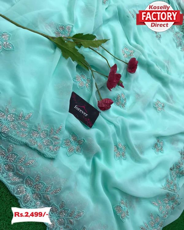 Light Blue Georgette Zari And Thread Embroidered Saree