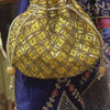 Yellow Embroidered Oval Thaili